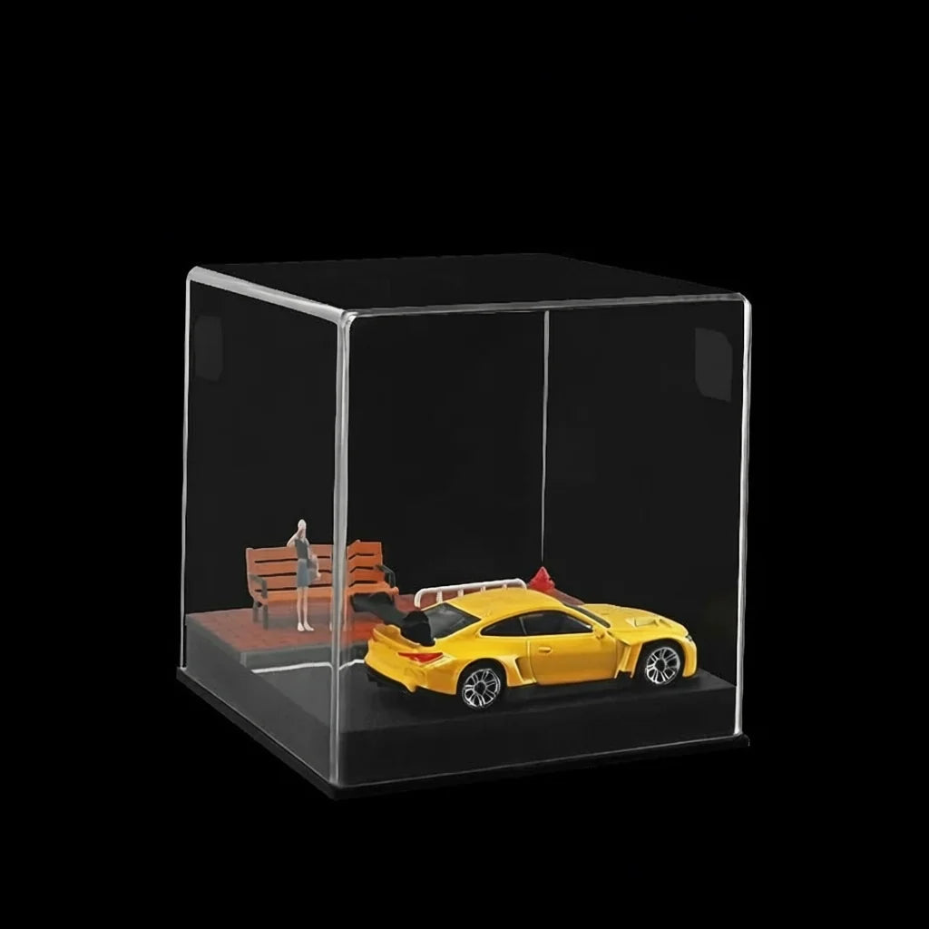 The orange brick road street corner scene under its clear acrylic cover, seen straight on