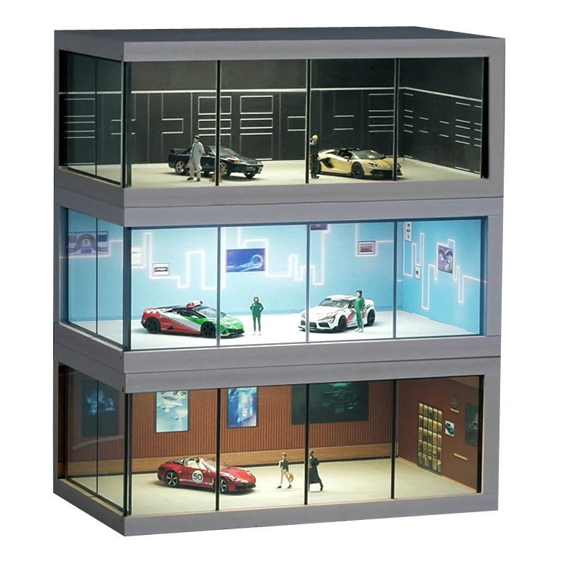 Three 1:64 showroom display cases stacked in the black, blue and brown interior colorways