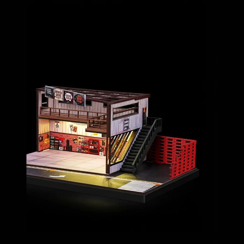 Empty two-storey garage diorama on a black background, staircase and brick wall in view