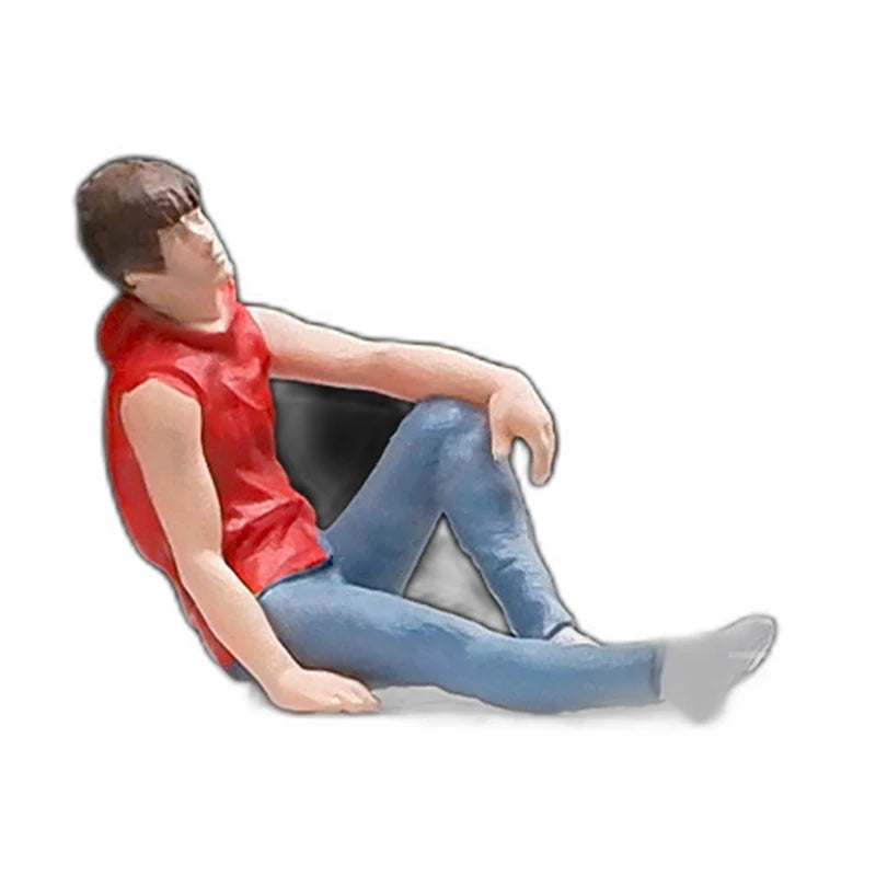 1:64 Miniature Figures – 50 People, Animals & Props, Seated Boy – Red base