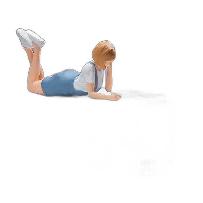 1:64 Miniature Figures – 50 People, Animals & Props, Girl Lying Down – Blue & White base
